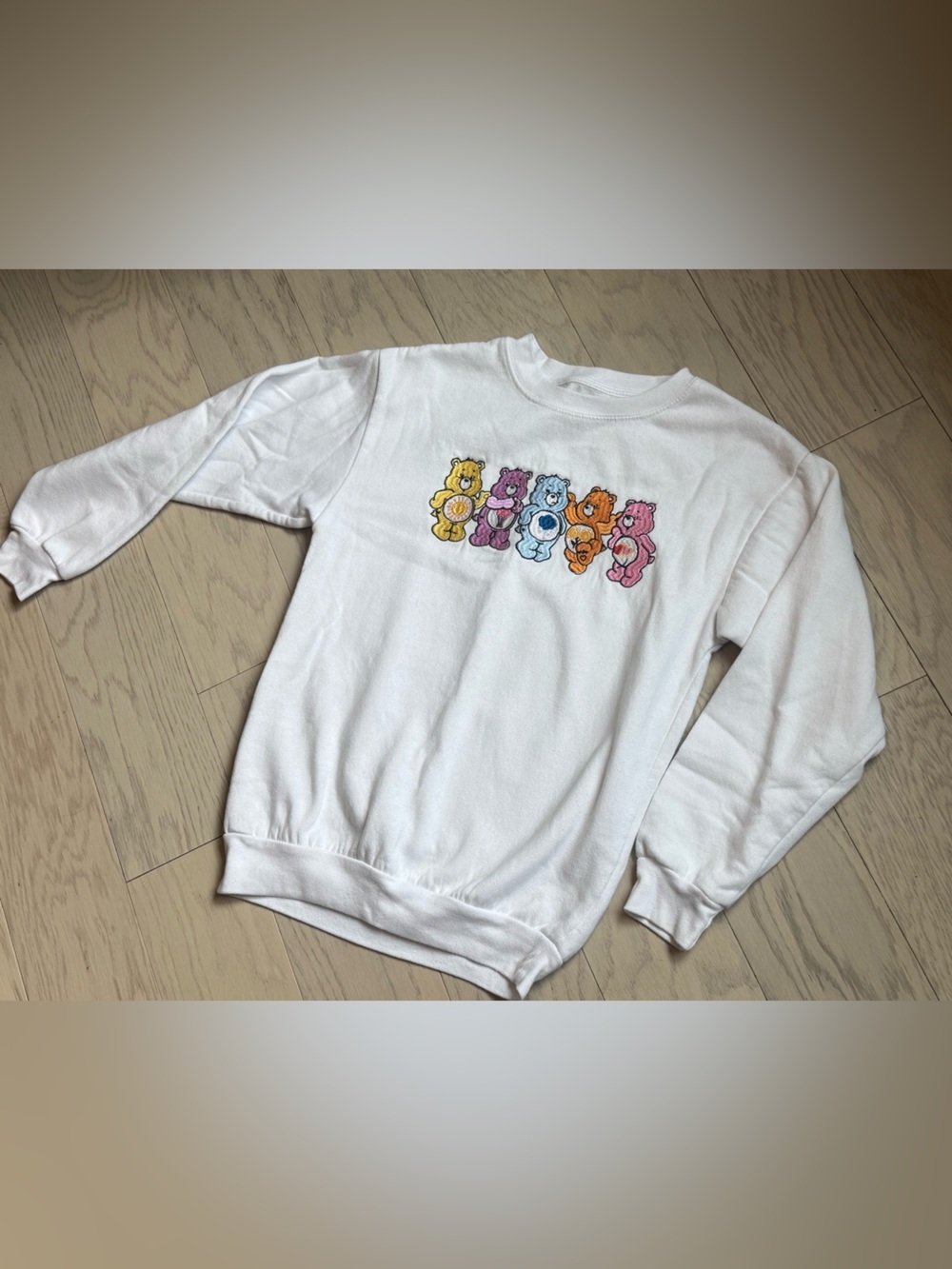Care Bears  White Crew Sweatshirt with Grumpy Bear on Back